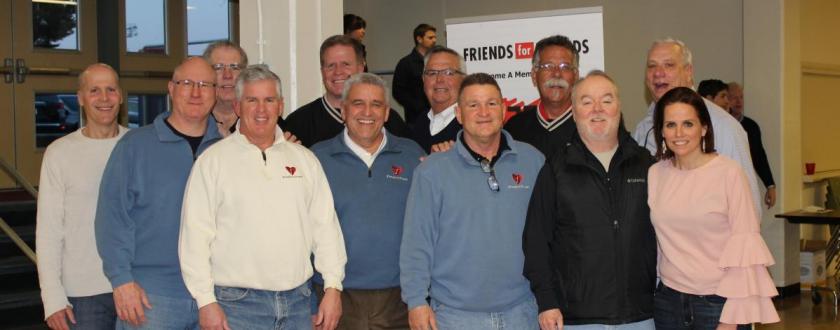 group shot members in the O'Hara gym